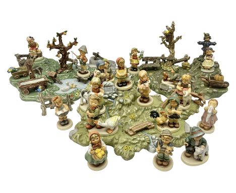 Collection Hummel figures by Goebel, together with three hummel landscapes, Hummel Quelle, Hummel Weiher and Hummel Garten