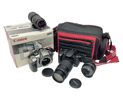 Two Canon camera bodies, comprising EOS 350D serial no. 1830736641, with 'Canon Zoom lens EF 75-300mm, 1;4-5.6' lens, EOS 300