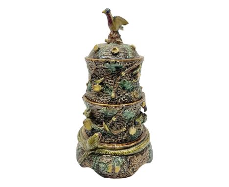 Majolica smokers set, in the form of a tree trunk, decorated with animals and a bird finial, dividing into three sections com