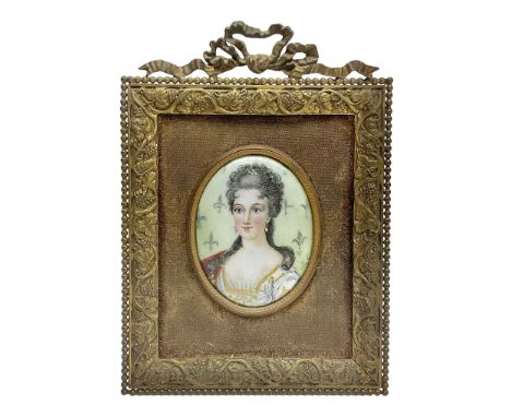 19th century portrait miniature on enamel, depicting a Georgian lady in period dress, hand painted with gilt detailing, in gi