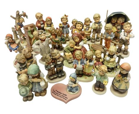 Twenty two Hummel figures by Goebel, to include Stormy Weather, Forty Winks, Little Thrifty, Sparkling Shell etc 