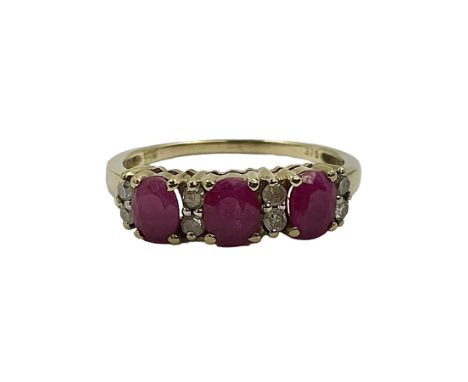 9ct gold three stone oval ruby and cubic zirconia ring, hallmarked and boxed Condition Report:Approx 2.35 grams, size P-Q, we