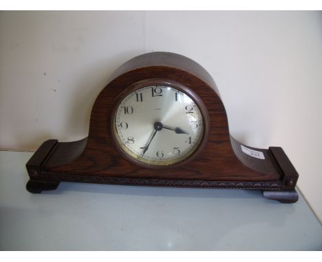 8 day steel faced oak cased mantel clock (19cm high)