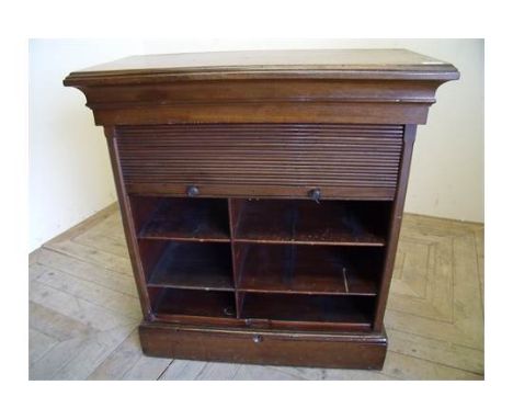 Edwardian mahogany roll up front office pigeon hole cabinet with multi-sectional interior enclosed by roller shutter door (80