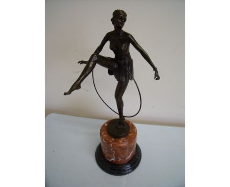 Bronze Art Deco style semi clad dancing girl with hula hoop on circular column marble base (height 48cm)