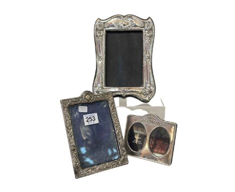 Three silver easel photographs frames, the largest Birmingham 1910, 22cm high.