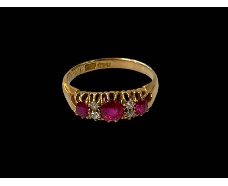 Edwardian ruby and diamond seven stone 18 carat gold ring, size N/O.