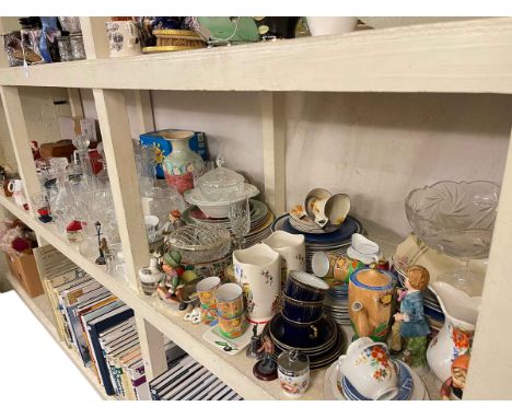 Full shelf of glass and china, cutlery, three boxes of soft toys and linen, etc.