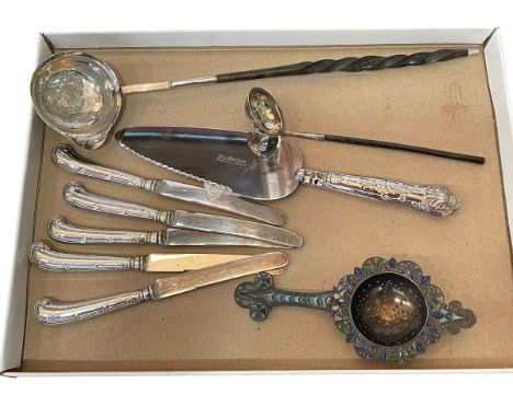 Small Irish silver tody ladle, Dublin 1828, Georgian tody ladle, silver handled knives and slice, and tea strainer (5).