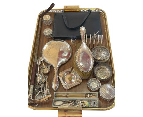Tray of mostly silver pieces including brushes and mirror, bowls, toilet jars, toast rack, ashtray, etc.