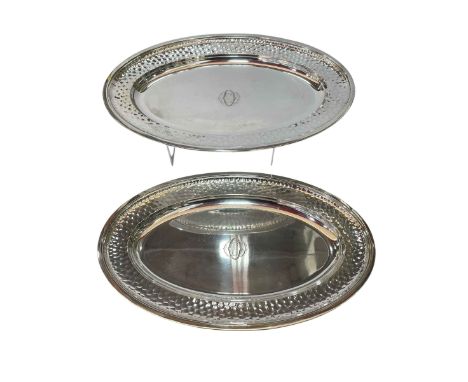Pair of W Stuttgen 800 silver oval trays, 45cm across.