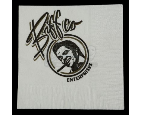 A Biffco Enterprises cocktail napkin from Robert Zemeckis' sci-fi adventure sequel Back to the Future Part II. Marty McFly (M