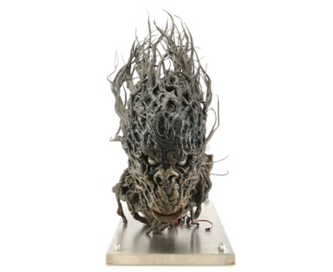 An animatronic Tartutic creature head from M. Night Shyamalan's dark fantasy film Lady in the Water. The Tartutic creatures d