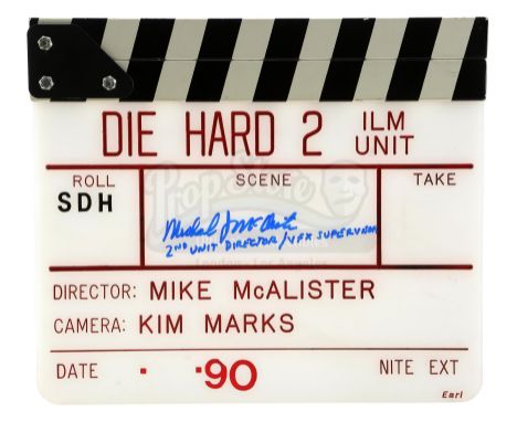 An ILM visual effects clapperboard from the production of Renny Harlin's action sequel Die Hard 2. The clapperboard is made f