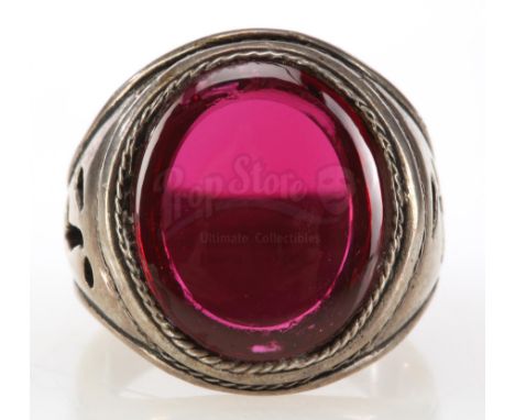 A faux ruby ring from Russell Mulcahy's action adventure The Shadow. In the film, playboy Lamont Cranston (Alec Baldwin) terr