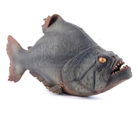 A piranha puppet from Joe Dante's horror comedy Piranha. A school of piranha were genetically engineered by the American mili