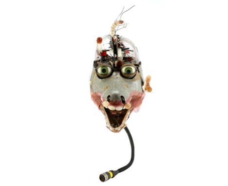 Robbie Sinclair's (Jason Willinger) animatronic head from the prehistoric television sitcom Dinosaurs. Like most of the rest 