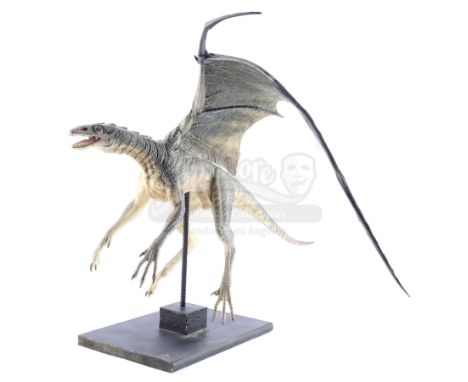 A dragon maquette display with wings from the production of Ivan Reitman's sci-fi comedy Evolution. Alien life stored on a me