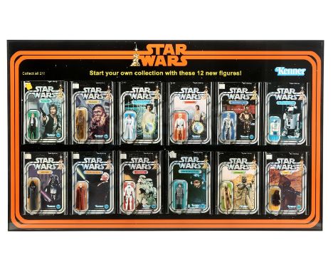 A set of vintage Kenner action figures in a custom-made frame from the promotion George Lucas' Star Wars: A New Hope in a cus