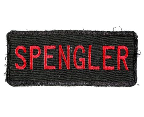 Egon Spengler's (Harold Ramis) Ghostbusters uniform patch from Ivan Reitman's action-comedy sequel Ghostbusters 2. Spengler r