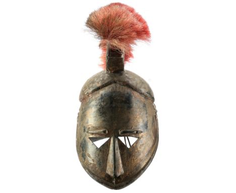 A Joppa guard helmet from Desmond Davis' fantasy adventure film Clash of the Titans. The city guards wore their helmets while