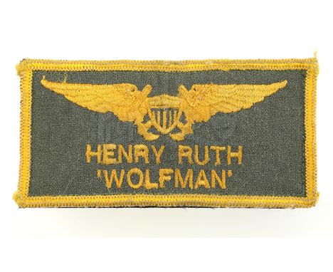 Leonard "Wolfman" Wolfe's (Barry Tubb) flight suit patch from Tony Scott's action drama Top Gun. Navy pilot Wolfe wore his ID