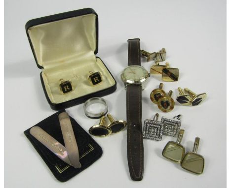 A Newmark Corvette gentleman's wristwatch, a pair of Charles Tyrwhitt silver shirt collar stays, titanium wedding band, and a