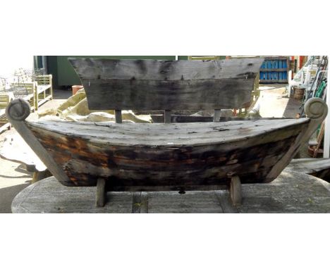 A galley type wooden garden bench, 222cm long.