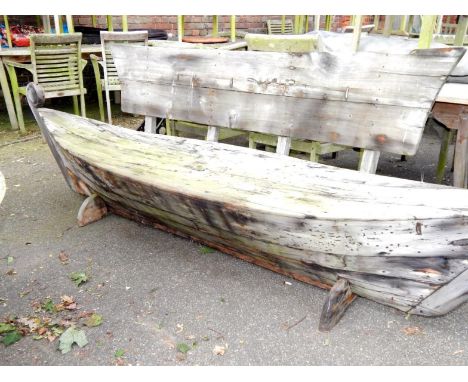 A galley type wooden garden bench, 300cm long.