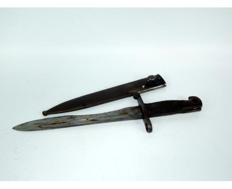 A Spanish bow bayonet, serial number 594/1 sheathed.