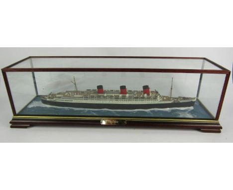 A scale model of the liner Queen Mary, cased with name plate, 63½ x 18½ x 19cm.