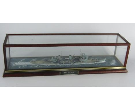 A scale model of the light cruiser HMS Belfast, cased with name plate, 49 x 13 x 13cm.