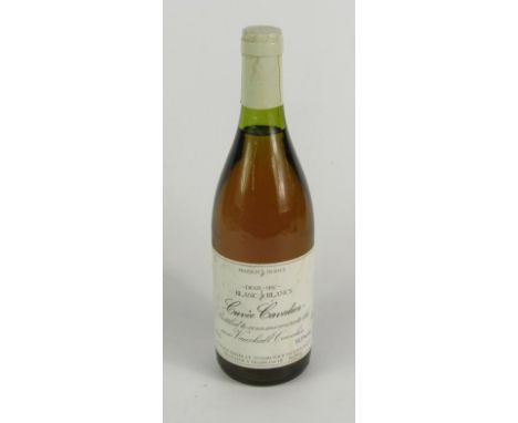 A bottle of Cuvee Cavalier demi sec blanc de blancs, bottled to commemorate the new Vauxhall Cavalier.