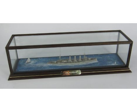 A scale model of the armored cruiser HMS Monmouth, cased with name plate, 43½ x 14 x 12½cm. 