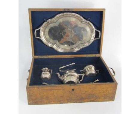 A Victorian silver tea set, with engraved basket weave and embossed floral decoration, John Samuel Hunt, London, 1862, retail