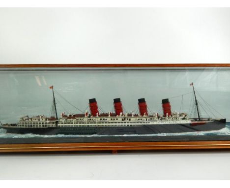 A scale model of the Mauretania, cased with no name plate, 95 x 24 x 22½cm.