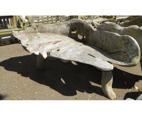 A two seater driftwood bench.