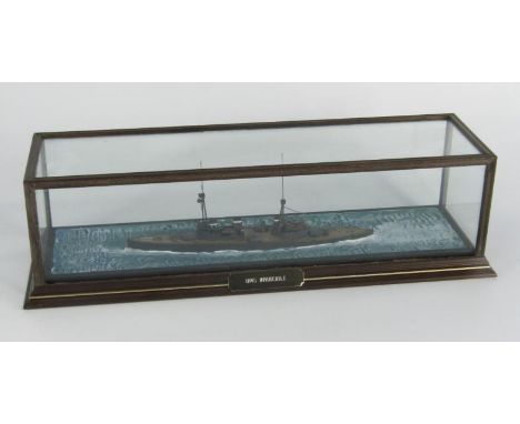 A scale model of the battle cruiser HMS Invincible, cased with name plate, 43 x 13½ x 12cm.