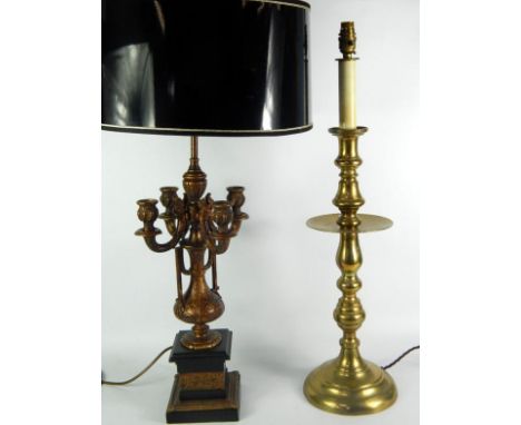 A wooden and painted metal candelabra form table lamp, 88cm high, and a brass candlestick form table lamp, 71.5cm high, (2).