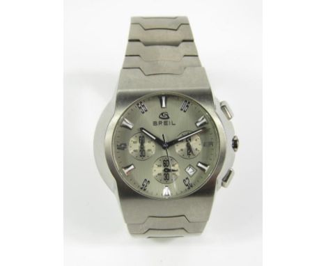 A gentleman's titanium chronograph wristwatch, vertical striped silvered dial bearing Arabic numerals, three subsidiary dials