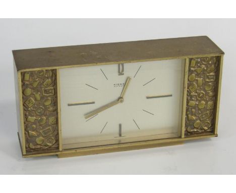 A Kienzle automatic brass cased mantel clock, rectangular case with silvered dial, battery operated, 23 x 3½ x 11½cm.