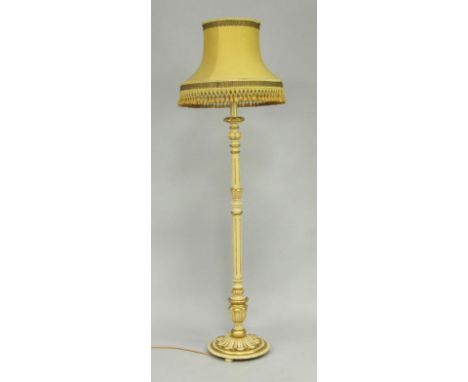 A cream and gilt painted fluted and lappet carved standard lamp, 180cm high.