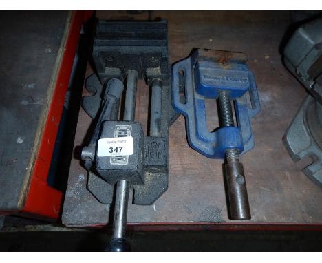A Clarke 102 bench vice, and a Record power bench vice, (2). Viewing: Tuesday 12th July 10am to 4pm Grangeway Road Wigston LE