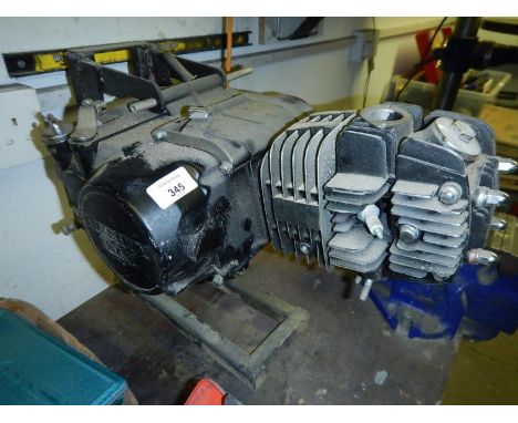 A Mighty Mini engine, on steel frame bracket. Viewing: Tuesday 12th July 10am to 4pm Grangeway Road Wigston LE18 1JE. Collect