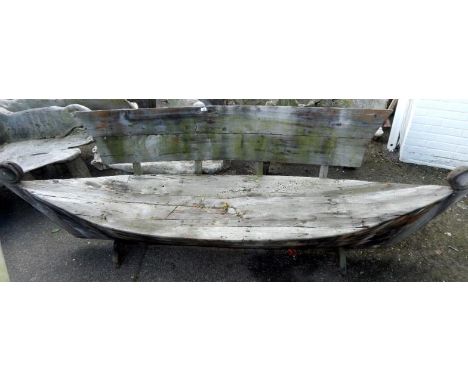 A galley type wooden garden bench, 300cm long.
