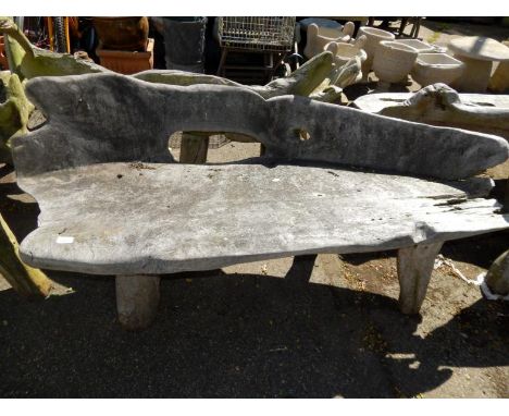 A two seater driftwood bench.