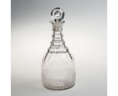 A 19th CENTURY MALLET-FORM GLASS DECANTER, the body panel cut, with triple ring neck and bulls-eye stopper. 29cm