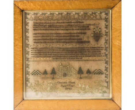 AN EARLY VICTORIAN NEEDLEWORK SAMPLER, Charlotte North, Aged 8 Years, 1840, worked with a building, trees and motto, in a per