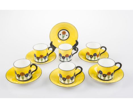 A ROYAL WORCESTER COFFEE SET, circa 1922 comprising six cups and six saucers, decorated in the Art Deco taste with stylised e