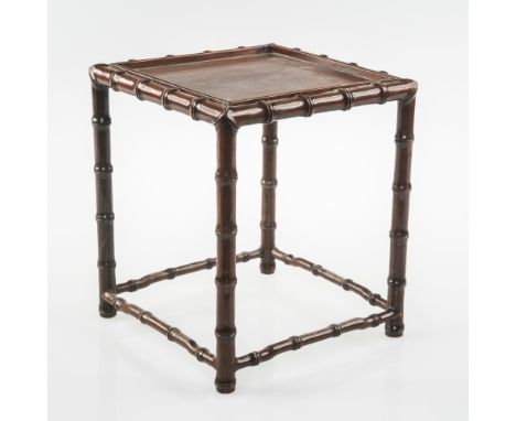 A CHINESE TABLE OF SMALL PROPORTIONS, the square inset panel top with carved bamboo style frame, supports and stretcher, 20cm